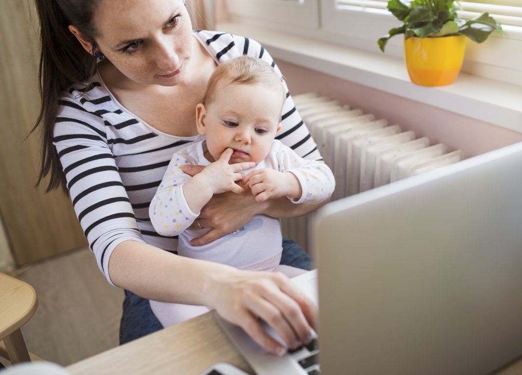 Young mother working from home